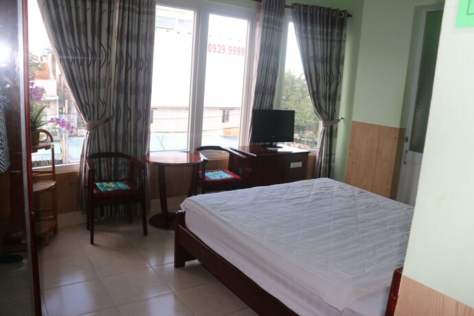 Imagen de la habitación del Hotel Kim Long. Foto 10
