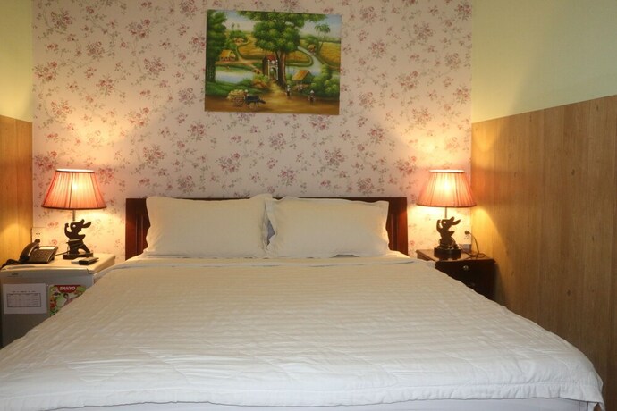 Imagen de la habitación del Hotel Kim Long. Foto 19