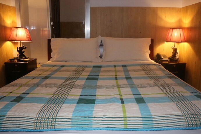 Imagen de la habitación del Hotel Kim Long. Foto 26