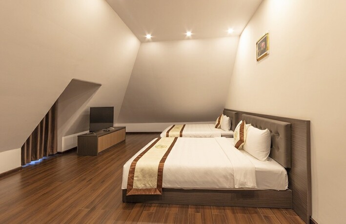 Imagen de la habitación del Hotel Kim Resort - Khu Nghĩ Dưỡng Rừng L&aacute; Kim. Foto 10