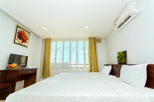 Imagen de la habitación del Hotel Kim Yen, District 1 - Ho Chi Minh. Foto 9