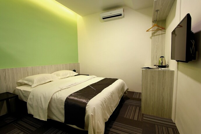 Imagen de la habitación del Hotel Kimal Kamunting. Foto 13