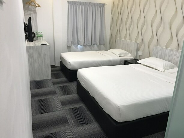 Imagen de la habitación del Hotel Kimal Kamunting. Foto 16