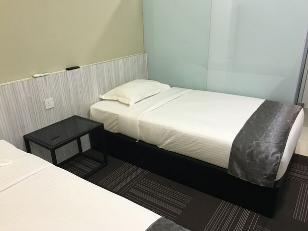 Imagen de la habitación del Hotel Kimal Kamunting. Foto 18