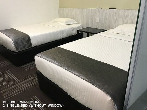 Imagen de la habitación del Hotel Kimal Kamunting. Foto 20
