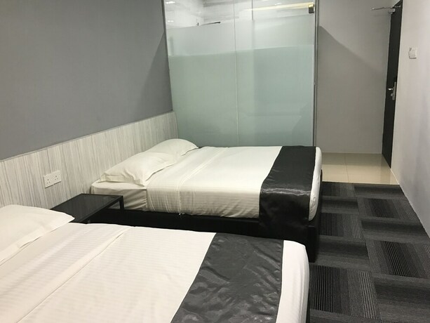 Imagen de la habitación del Hotel Kimal Kamunting. Foto 25