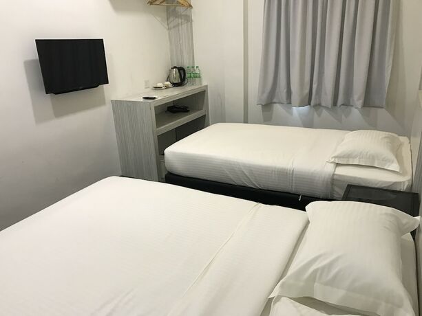 Imagen de la habitación del Hotel Kimal Kamunting. Foto 30