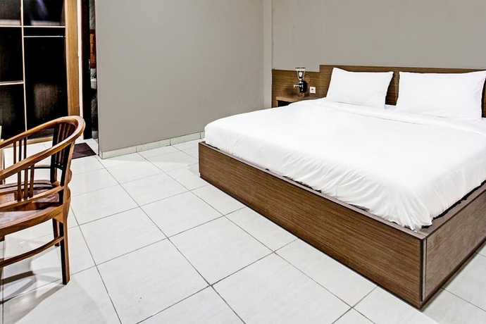 Imagen de la habitación del Hotel Kimara Homestay. Foto 8