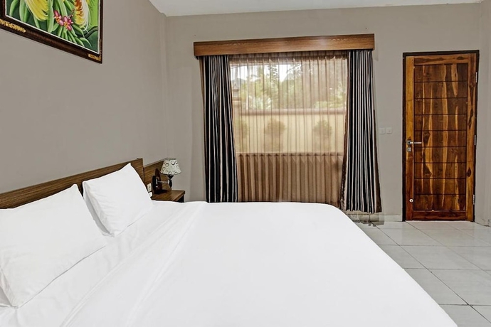 Imagen de la habitación del Hotel Kimara Homestay. Foto 10