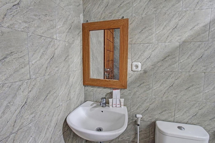 Imagen de la habitación del Hotel Kimara Homestay. Foto 12