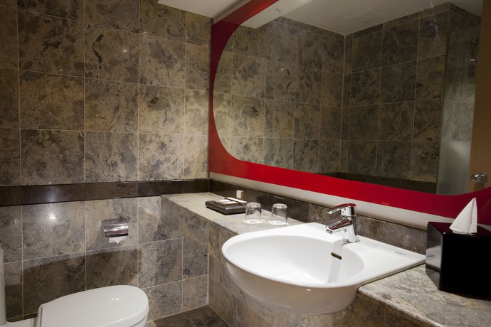 Imagen de la habitación del Hotel Kimaya Slipi Jakarta by Harris. Foto 12