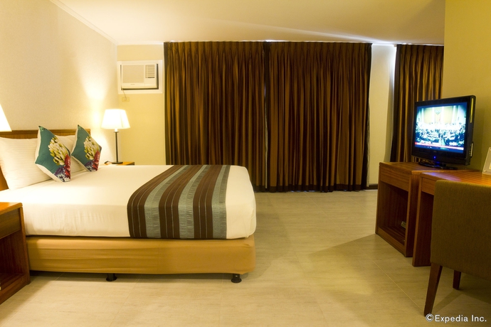 Imagen de la habitación del Hotel Kimberly Manila. Foto 3