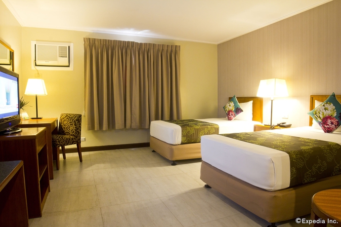 Imagen de la habitación del Hotel Kimberly Manila. Foto 7