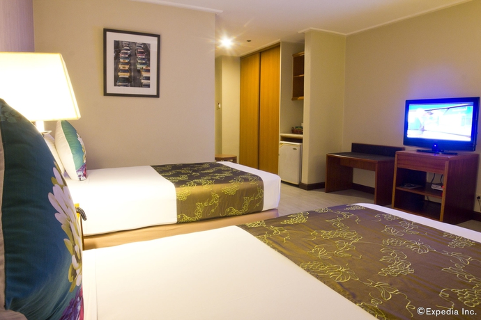 Imagen de la habitación del Hotel Kimberly Manila. Foto 10