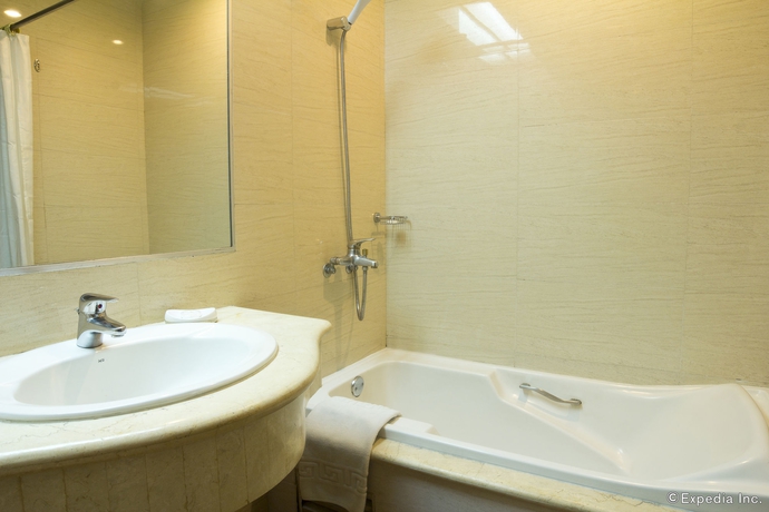 Imagen de la habitación del Hotel Kimberly Manila. Foto 11