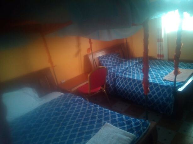 Imagen de la habitación del Hotel Kimbo Pefa Guest House. Foto 14