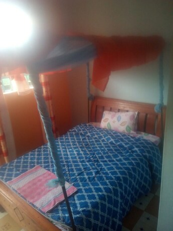 Imagen de la habitación del Hotel Kimbo Pefa Guest House. Foto 16