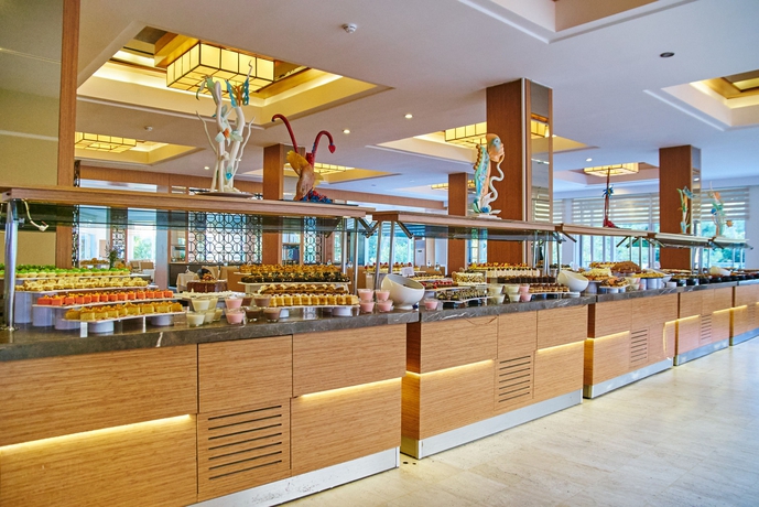 Imagen del bar/restaurante del Hotel Kimeros Park Holiday Village. Foto 5