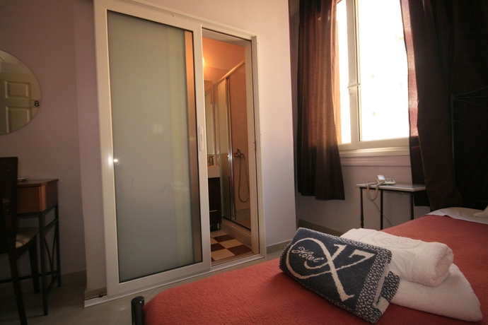 Imagen de la habitación del Hotel Kimon Athens. Foto 7