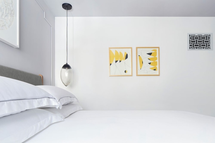 Imagen de la habitación del Hotel Kimpton Virgilio. Foto 13