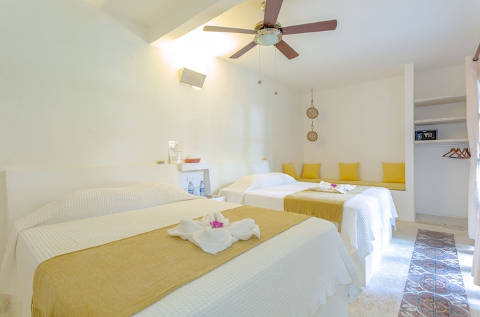 Imagen de la habitación del Hotel Kin Ha Tulum. Foto 2