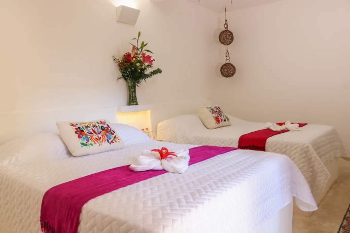 Imagen de la habitación del Hotel Kin Ha Tulum. Foto 3