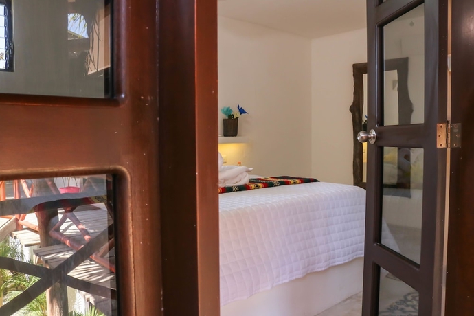 Imagen de la habitación del Hotel Kin Ha Tulum. Foto 7