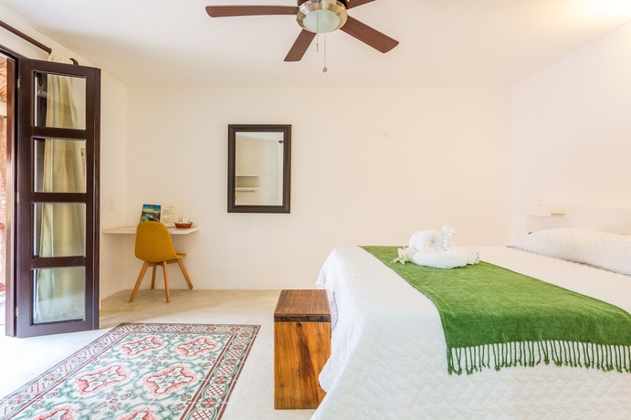 Imagen de la habitación del Hotel Kin Ha Tulum. Foto 8