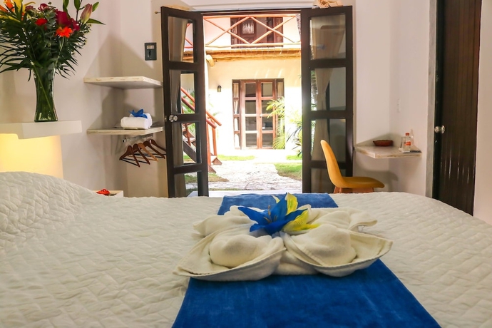 Imagen de la habitación del Hotel Kin Ha Tulum. Foto 15