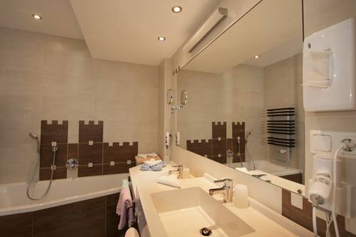 Imagen de la habitación del Hotel Kinderhotel Laderhof. Foto 7