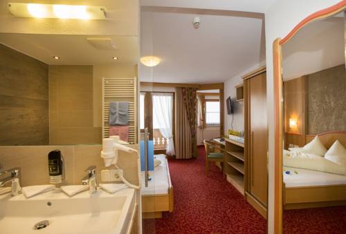Imagen de la habitación del Hotel Kinderhotel Laderhof. Foto 9