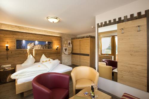 Imagen de la habitación del Hotel Kinderhotel Laderhof. Foto 10