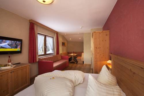 Imagen de la habitación del Hotel Kinderhotel Laderhof. Foto 15