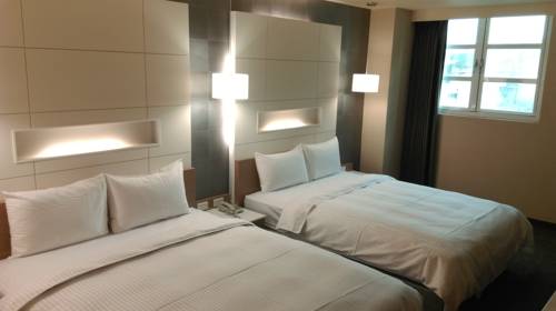 Imagen de la habitación del Hotel Kindness Hualien. Foto 5