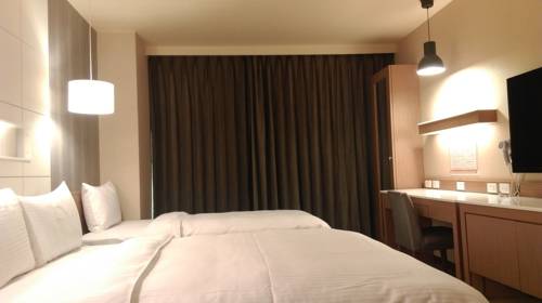 Imagen de la habitación del Hotel Kindness Hualien. Foto 6