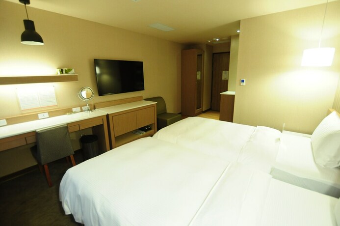 Imagen de la habitación del Hotel Kindness Juemin. Foto 13