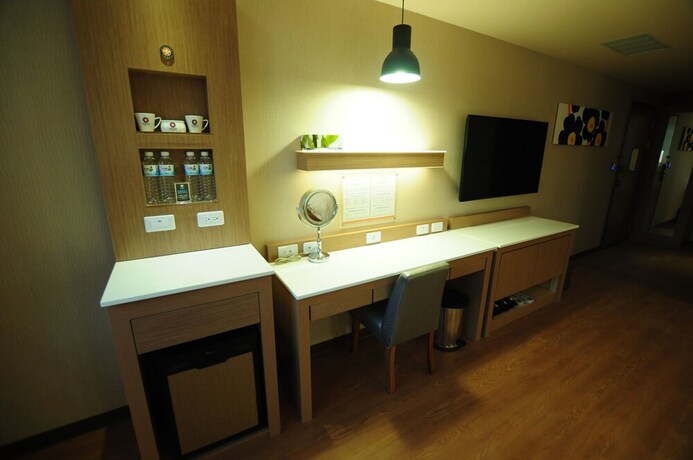 Imagen de la habitación del Hotel Kindness Juemin. Foto 14