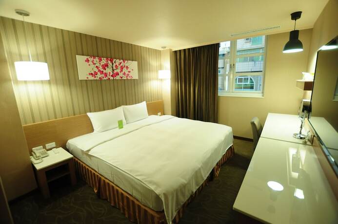 Imagen de la habitación del Hotel Kindness Juemin. Foto 18