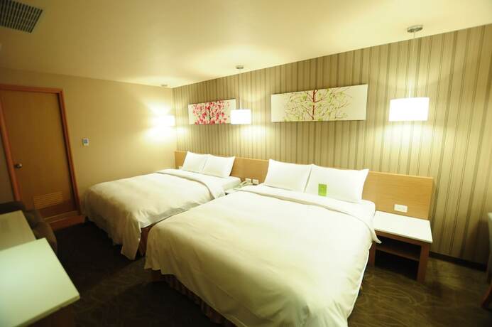 Imagen de la habitación del Hotel Kindness Juemin. Foto 19