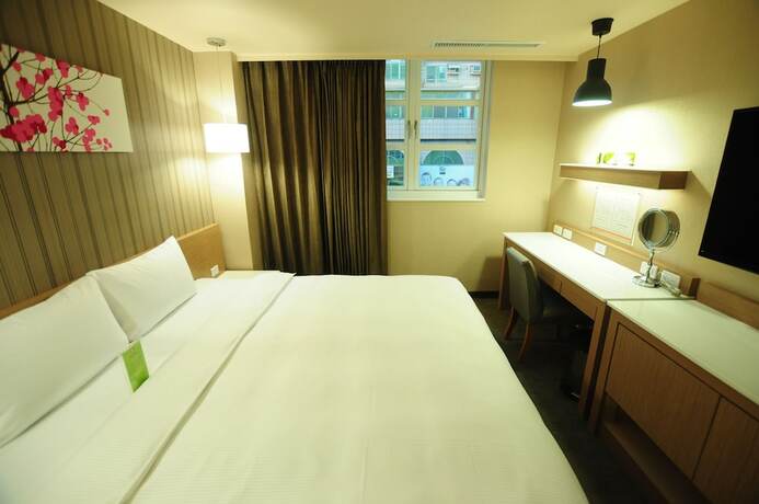 Imagen de la habitación del Hotel Kindness Juemin. Foto 20