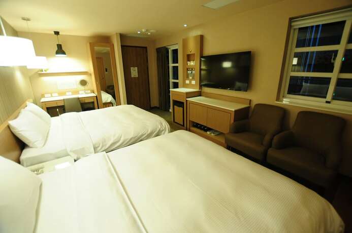 Imagen de la habitación del Hotel Kindness Juemin. Foto 23