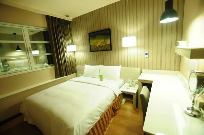 Imagen de la habitación del Hotel Kindness Juemin. Foto 24