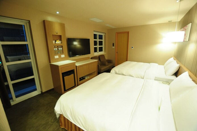 Imagen de la habitación del Hotel Kindness Juemin. Foto 29