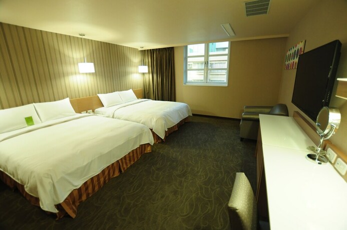 Imagen de la habitación del Hotel Kindness Juemin. Foto 31