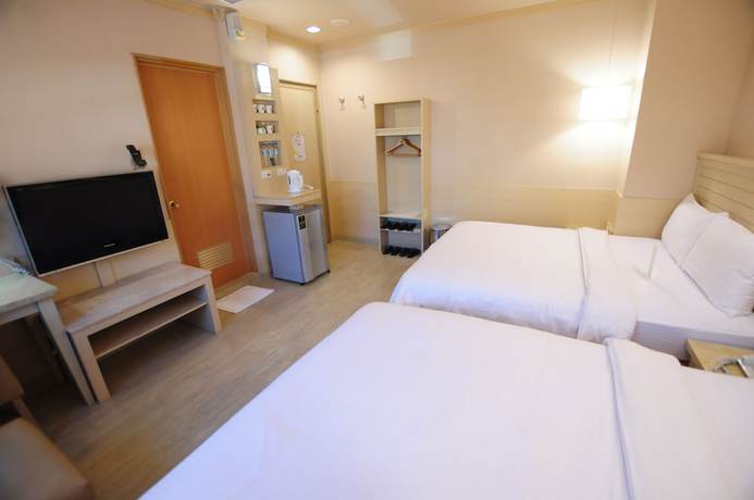 Imagen de la habitación del Hotel Kindness Min Sheng. Foto 11