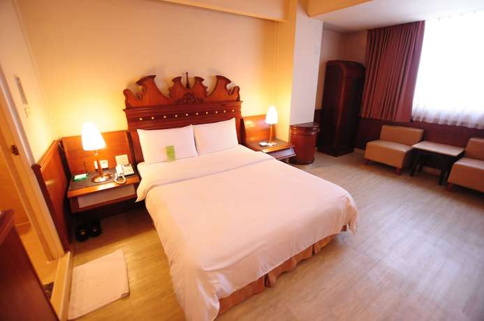 Imagen de la habitación del Hotel Kindness Wu Jia. Foto 2