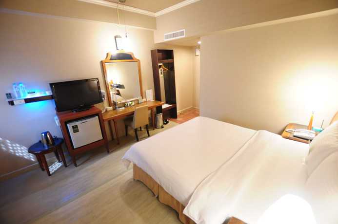 Imagen de la habitación del Hotel Kindness Wu Jia. Foto 15