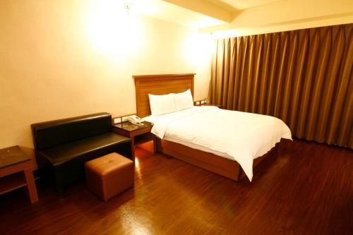 Imagen de la habitación del Hotel Kindness Yuanlin. Foto 6