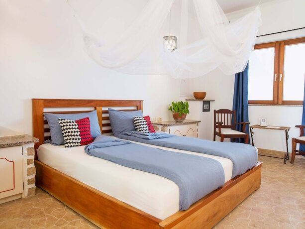 Imagen de la habitación del Hotel King Fisher Village. Foto 12