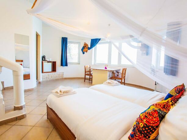 Imagen de la habitación del Hotel King Fisher Village. Foto 13